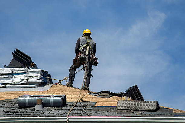Professional Gutter Installation technician working in Lake, MI